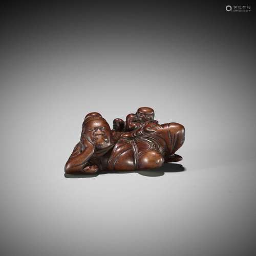 A RARE WOOD MITATE NETSUKE OF SHOKI AND ONI