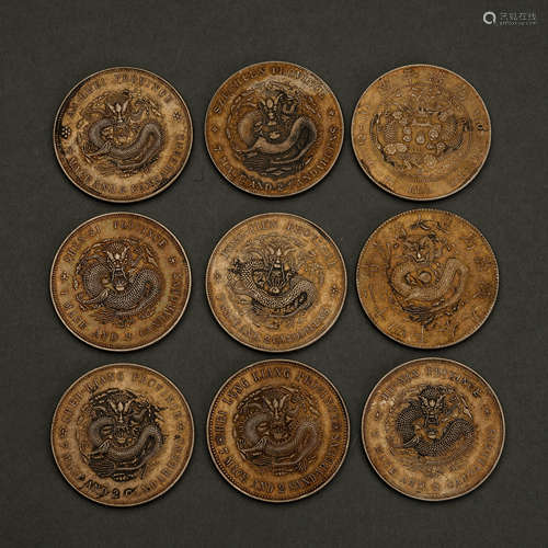 Nine Guangxu Yuanbao Silver Coins