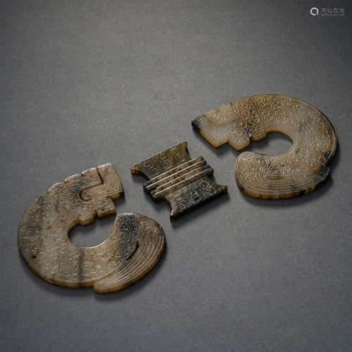 A set of three pieces of Hetian jade ornaments in the Han Dy...