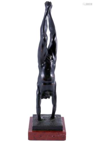 Bronze naked boy doing a handstand, probably after Ludwig Ha...