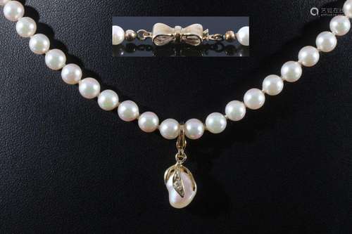 585 gold pearl necklace with diamond pendant and gold clasp,...