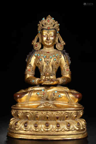 Gilt bronze inlaid with green pine agate seated Buddha