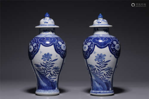 Qing Dynasty, blue and white flower cover jar pair