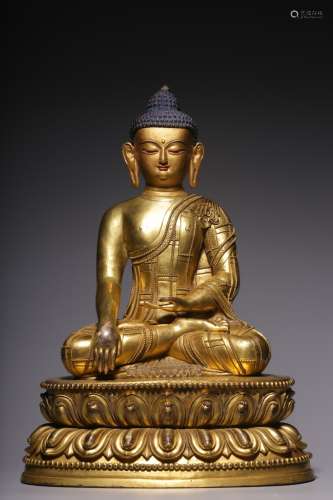 Gilded bronze statue of Sakyamuni seated