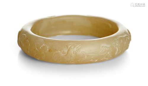 A CHINESE YELLOWISH-WHITE JADE ZODIAC BANGLE 20TH CENTURY