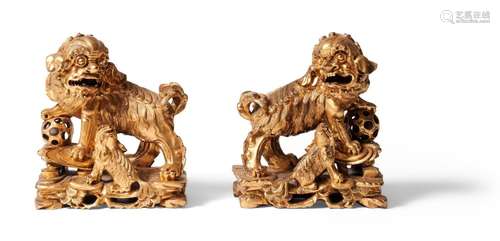 PAIR OF CHINESE CARVED AND GILT WOOD GUARDIAN LIONS REPUBLIC...