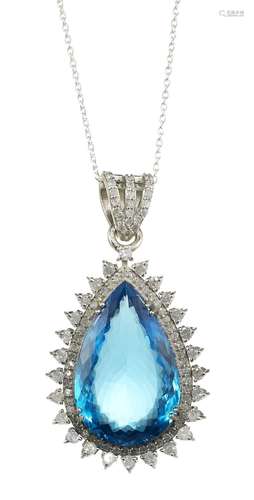 *Pendentif serti d'une topaze bleue taille poire (15,1 ct) e...