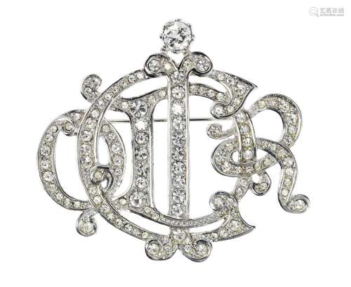 Christian Dior, broche monogrammée pavée de pierres d'imitat...