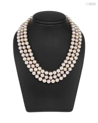Collier composé de trois rangs de perles rosées (D env. 9 mm...