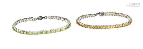 *Ensemble de deux bracelets lignes, l'un serti de péridots e...