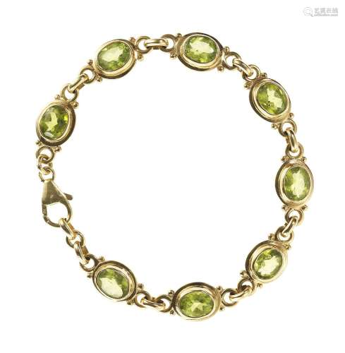 *Bracelet péridots serti de péridots taille ovale (env. 7 ct...