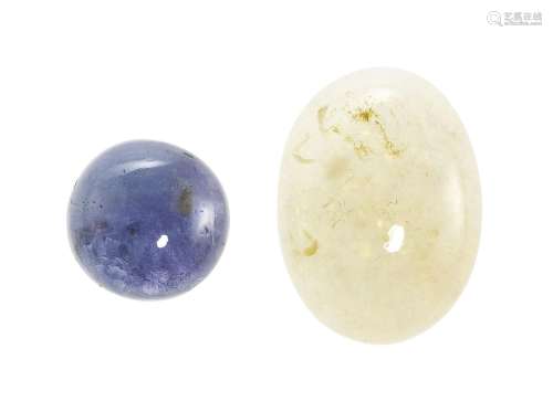 *Lot de deux pierres sur papier<br />
Une tanzanite ronde ta...