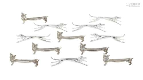 Ensemble de 12 porte-couteaux animaux en métal argenté, comp...