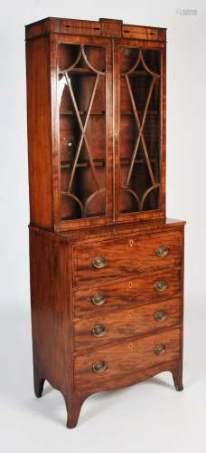 A George III mahogany and ebony lined secretaire bookcase of...