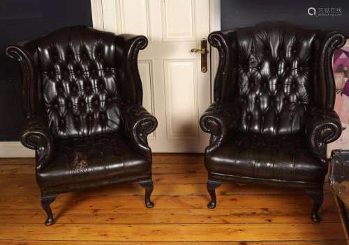 PAIR OF HIDE UPHOLSTERED WINGBACK ARMCHAIRS
