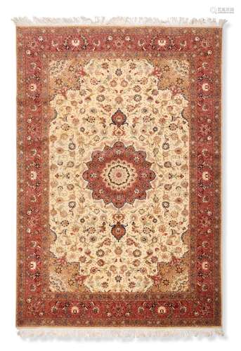 A Persian Tabriz Sherkat area rug