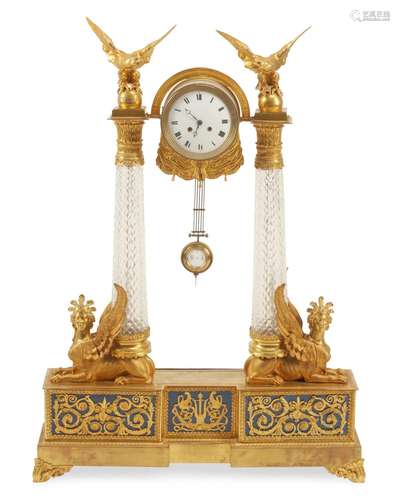 A large French Empire-style gilt-bronze mantle clock