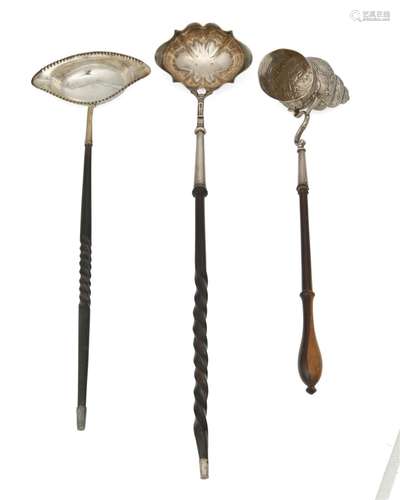 A group of English sterling silver punch ladles