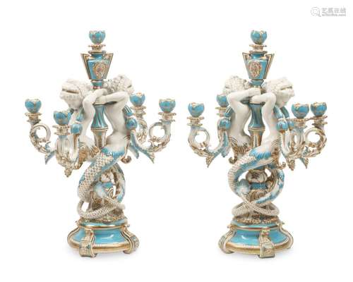 A pair of French Sevres-style porcelain candelabra