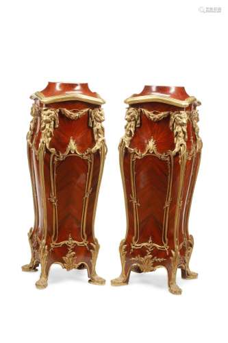 A pair of French Louis XV-style pedestals