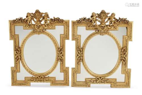 A pair of French Louis XV-style mirrors