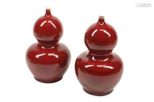 A pair of Chinese oxblood porcelain gourd vases