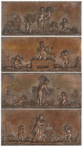 A set of four bronze wall plaques