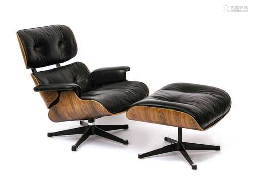 A lounge chair with ottoman - Design by Ray and Charles Eame...