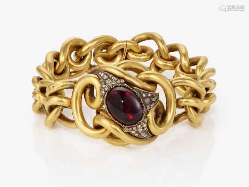 A bracelet with a garnet and diamonds - Probably England, ci...