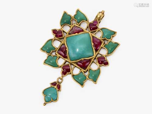 An Indian pendant with Persian influence decorated with turq...
