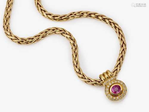 A necklace with a pendant with a ruby and brilliant-cut diam...