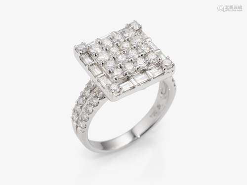 A modern cocktail ring decorated with brilliant- and baguett...