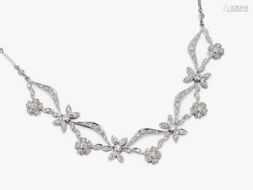 A floral stylized cocktail necklace decorated with brilliant...