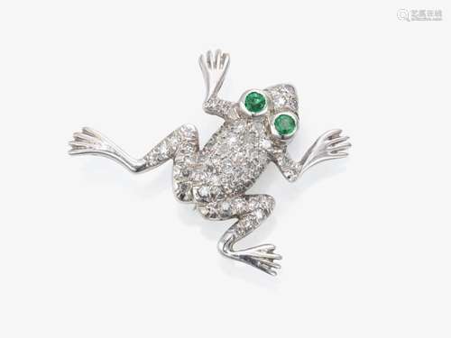 A ``jumping frog`` brooch decorated with diamonds and emeral...