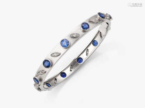 A bangle decorated with sapphires and diamonds - Germany, 19...