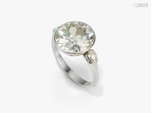 A solitaire ring with a large old-brilliant-cut diamond and ...