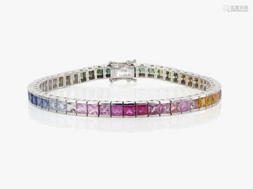 A Rivière bracelet decorated with rainbow-coloured sapphires...