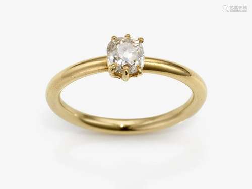 A solitaire ring with an old-cut diamond