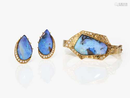 A bangle and a pair of clip earrings with boulder opals and ...