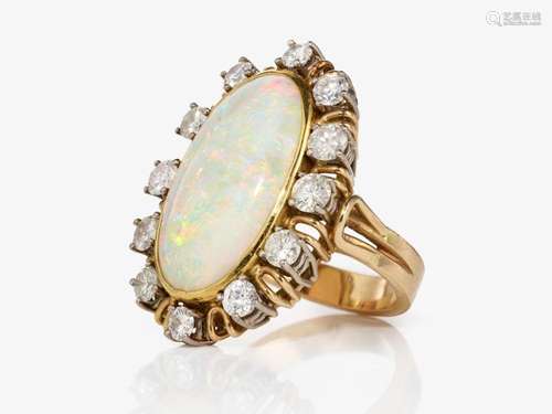 A ring with a white opal and brilliant-cut diamonds - German...