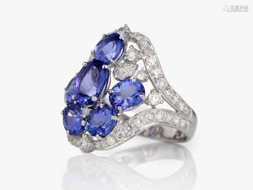 A cocktail ring decorated with tanzanites and brilliant-cut ...