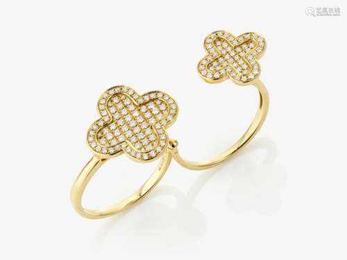 A convertible cloverleaf ring decorated with brilliant cut d...