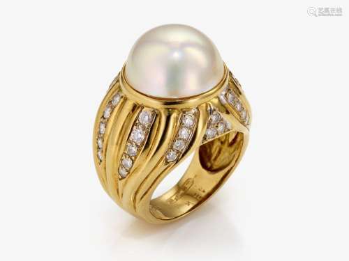 A ring with a South Sea cultured pearl and brilliant-cut dia...