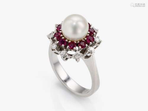 A cocktail ring decorated with brilliant-cut diamonds, rubie...