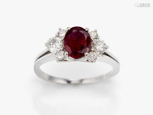 An eternity ring decorated with a ruby and brilliant-cut dia...