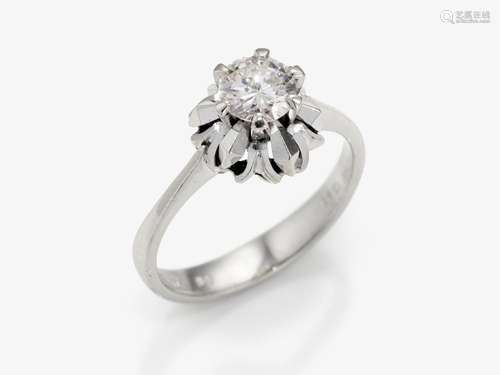 A solitaire ring with chaton setting