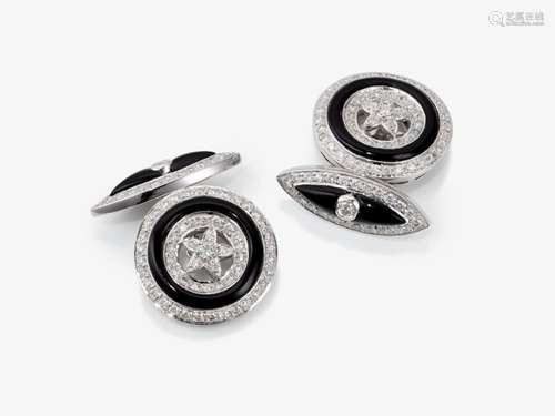 A pair of cufflinks with brilliant cut diamonds and onyxes -...