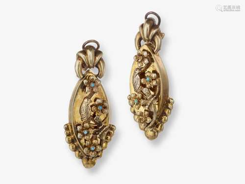 A pair of drop earrings with tendrils of flowers, birds and ...