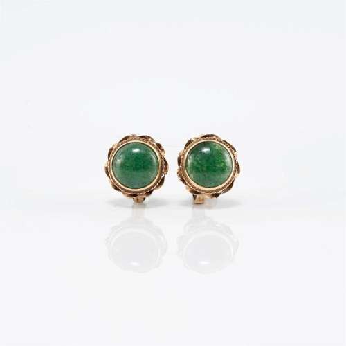 A pair of Chinese fourteen karat gold and jadeite earrings a...