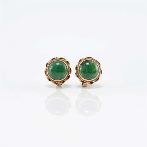 A pair of Chinese fourteen karat gold and jadeite earrings a...